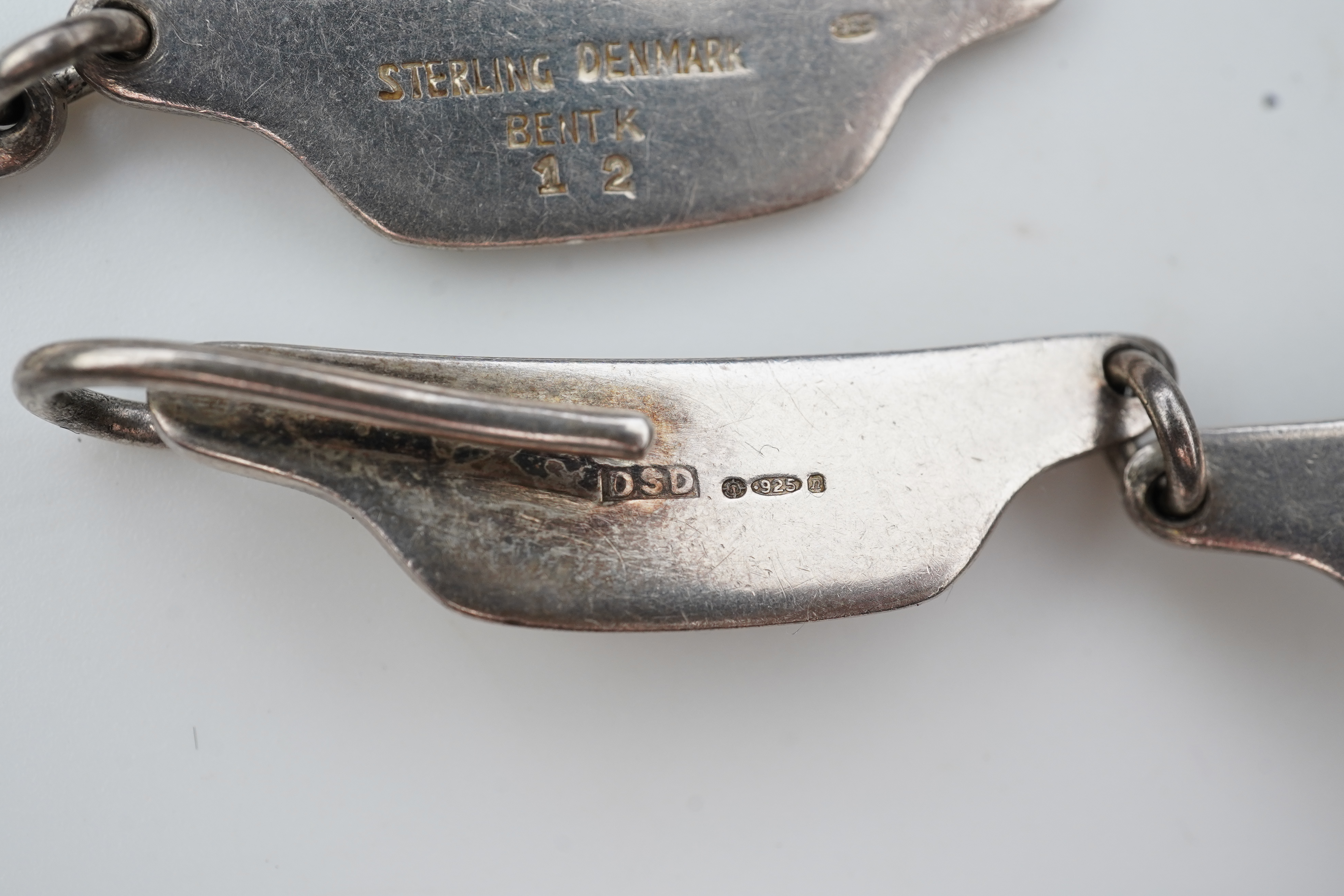 Bent Knudsen, a modernist silver necklace, Denmark, circa 1968, and a silver chain necklace